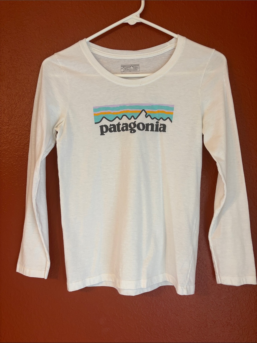 Patagonia White Long-Sleeve Tee with Multicolor Stripe Logo